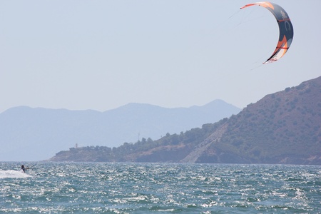 TURKEY,CALIS,JULY 2013 -Kite surfing is an extreme adventure sport described as a combination of wakeboarding windsurfing and paragliding のeditorial素材