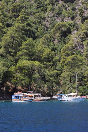 Boat trips around the bays of calis in Turkey with blue skys and deep blue seas, Turkey, calis, july, 2013のeditorial素材
