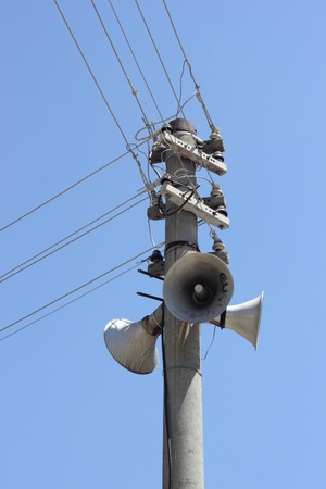 Telegraph poles against a blue skyの写真素材