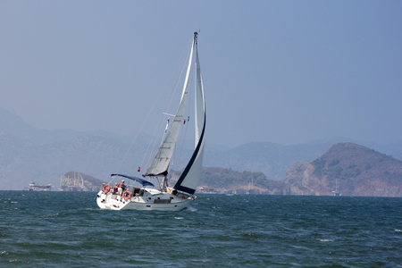 A yacht in full sail off the coast of Fethiye, Turkey,2014