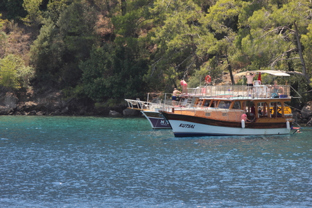 Boat trips around the bays of calis in Turkey with blue skys and deep blue seas, Turkey, calis, july, 2014のeditorial素材