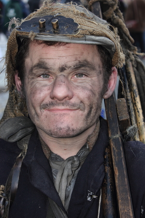 Unknown actor playing the part of a victorian chimney sweep at the yearly Christmas victorian festival in portsmouth dockyard, 2014のeditorial素材