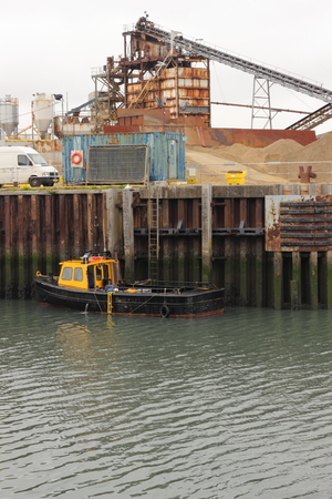 Aggregates being delivered by sea to portsmouth in england, 2015