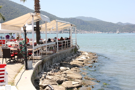 FETHIYE, TURKEY, 31ST MAY 2017 :Resturant seating along the promenade with views of fethiye in turkey, 31st may 2017のeditorial素材