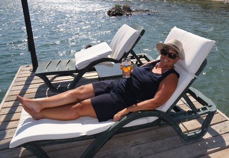 28TH JULY 2017, TURKEY: An english tourist having a drink relaxing on a sunbed while on vacation in turkey, 2017のeditorial素材