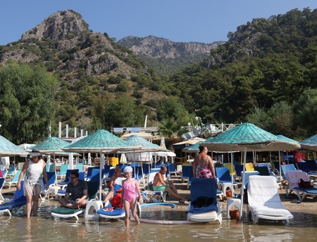 6TH AUGUST 2017,OULDENIZ,TURKEY :Umbrellas and sunbeds on a beach at Ouldeniz in Turkey,6th august...