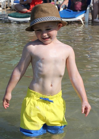 6TH AUGUST 2017,OULDENIZ,TURKEY : An unknown young boy in the sea while on vacation in turkey, 6th august 2017のeditorial素材