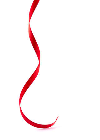 Red tape loop on a white backgroundの写真素材