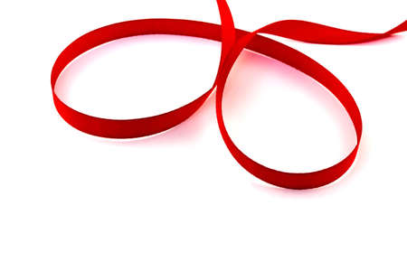 Red tape loop on a white backgroundの写真素材
