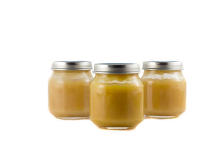 Three jars with fruit puree each otherの写真素材