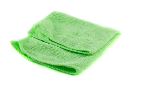 Green towel folded in the shape of a squareの写真素材