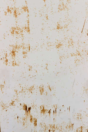 Old rusty metal wall white yellow texture