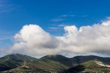 The landscape on the background of sea and mountainsの写真素材