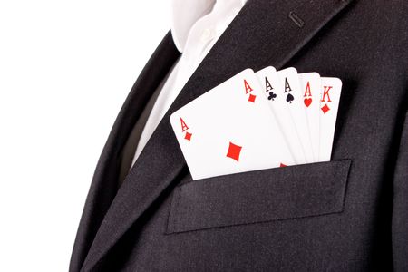 Business man with card and he has an ace up his sleeveの写真素材