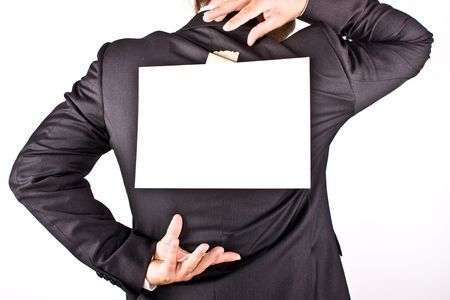 business man with a white sheet on the back on white backgroundの写真素材