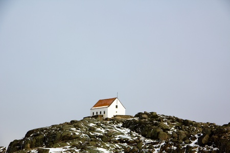 Small house on top of a mountainの写真素材
