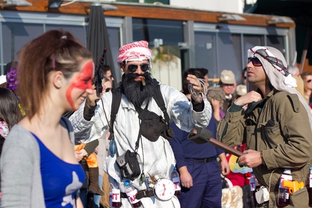 SESIMBRA, PORTUGAL - FEBRUARY 19: Man dreesed up as Bin Laden in the Carnival on February 19, 2012 in Sesimbra, Portugal.のeditorial素材