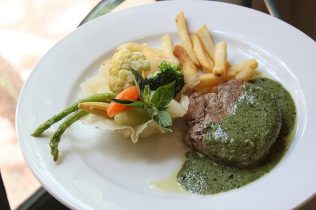 Steak with Basil Sauceの写真素材