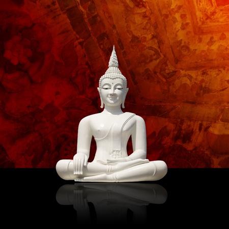 Isolated white buddha against colorful background  の写真素材