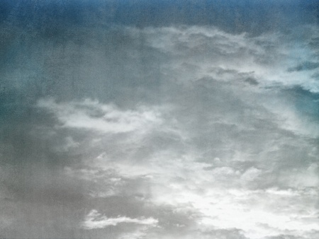 Grunge blue sky and clouds abstract background textureの写真素材