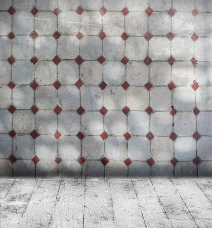 Grunge grey room with mosaic wall tiles and old floorboardの写真素材