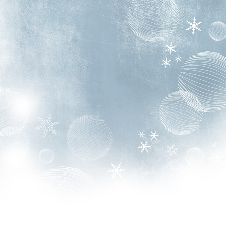 Blue white winter background texture with soft abstract snowflakesの写真素材