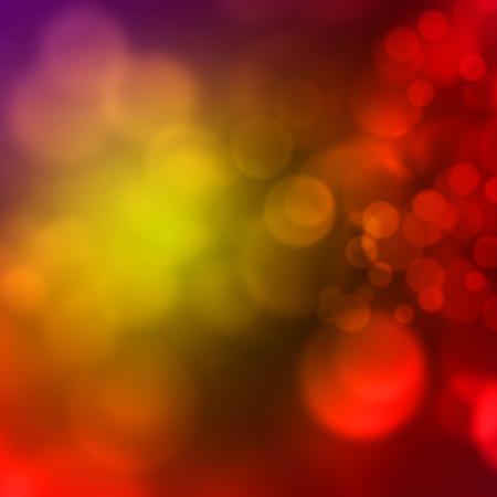 Abstract red background with blurred bokeh lightsの写真素材