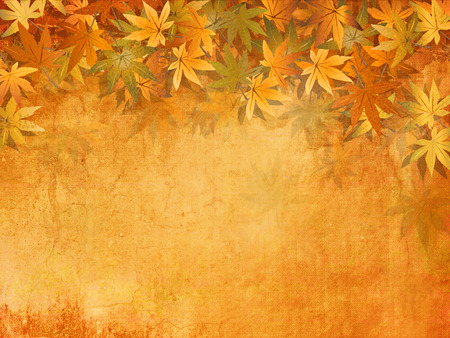 Fall leaves background in yellow orange autumn colors - vintage styleの写真素材