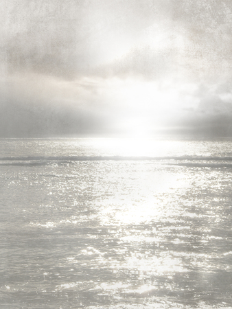 Gray horizon with sunburst - abstract sea backgroundの写真素材