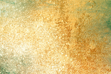 Gold background with sparkling glitter effect - abstract Christmas textureの写真素材