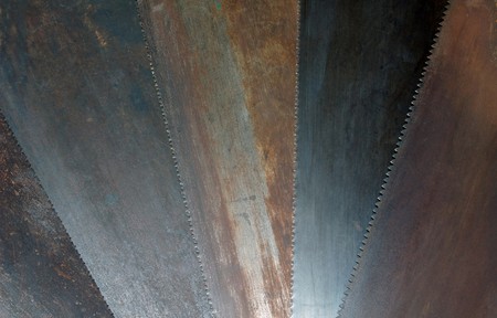 Rusted hand saw blades fanned