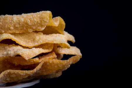 Fried Wonton on the dish with black backgrround and dramatic lightingの写真素材