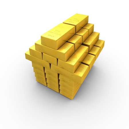 Gold bars stacked to form a houseの写真素材