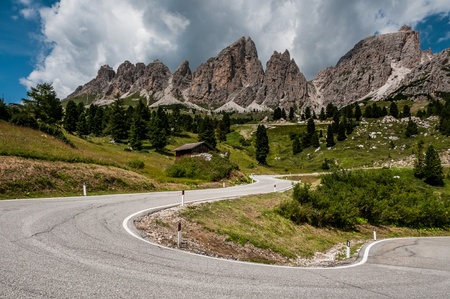 View of the road in the Dolomites near Passo Gardena の写真素材