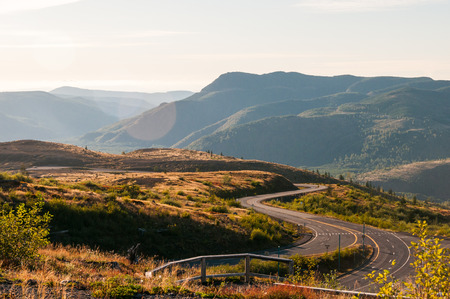 Evening view of empty road in hills の写真素材