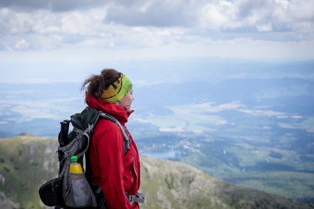 Female hikers enjoying scenic view in High Tatras. Hiking in Slovakia mountains.の写真素材