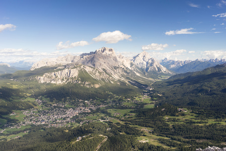 Scenic view of Cortina d'Ampezzo surrounded by majestic mountains. Dolomites National Park.の写真素材