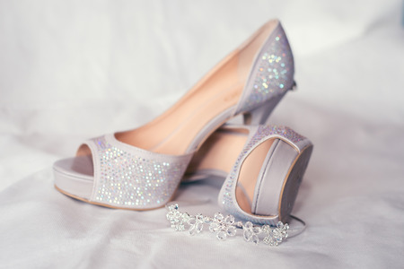Bride's high heel shoes and jewelry. Wedding illustration image.の写真素材