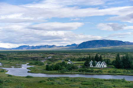 Scenic view of famous Thingvellir with white church, Iceland.の写真素材