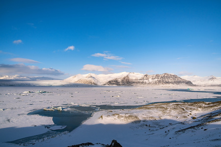 Dramatic icelandic landscape. Scenic view of icebergs in Jokulsarlon Glacier Lagoon, Iceland.