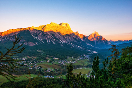 Great evening scene of Dolomite Alps, Cortina d'Ampezzo, southern Alps in the Veneto region of Northern Italy, Europe. Scenic view of majestic mountains in autumn time.の写真素材