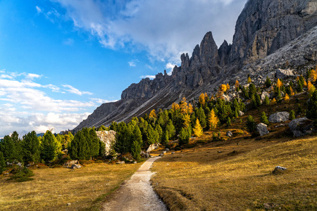 Mountain trails path in the Dolomites of South Tyrol. Alpine Valley in autumn. Val Contrin - Trentino Alto Adige (italy).の写真素材