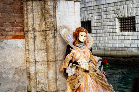 Traditional venetian mask in store on street, Venice Italy.の写真素材