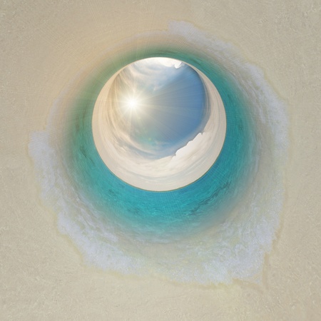 Surf wave on beach. Spherical tunnelの写真素材