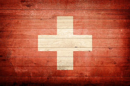 Switzerland national flag wood backgroundの写真素材