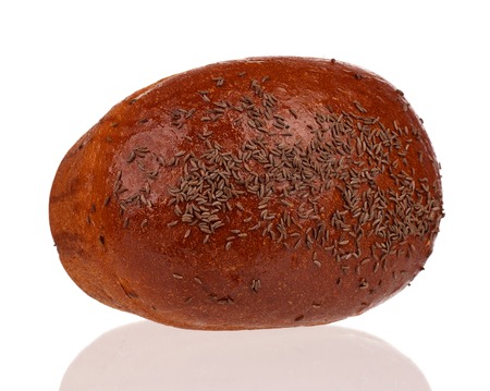 Fresh rye bread with caraway seeds isolated on white backgroundの写真素材