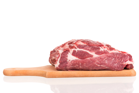 Fresh raw pork on the chopping board isolated on a white backgroundの写真素材