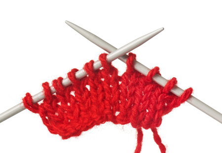 Model of knitting on spokes over white background close-upの写真素材