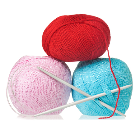 Colorful threads with knitting accessories isolated on white backgroundの写真素材