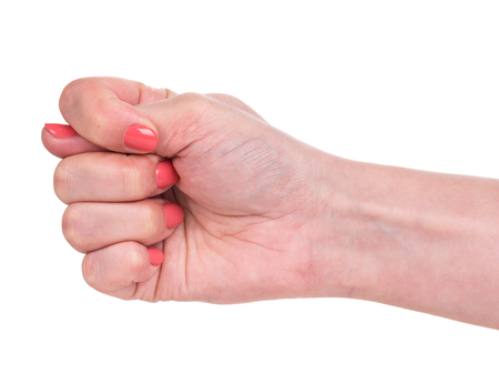 Female hand shows a gesture isolated over white backgroundの写真素材